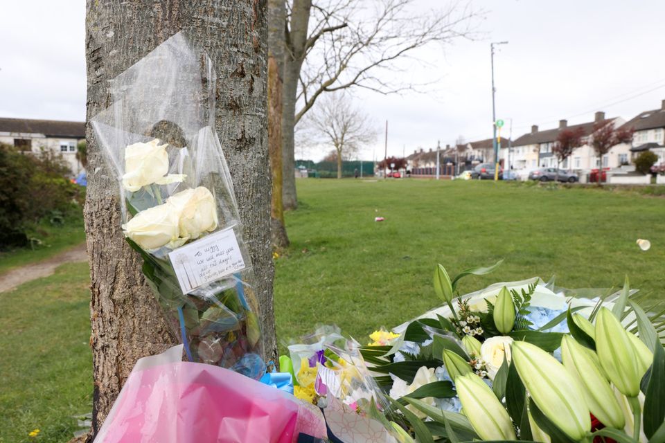 Flowers left close to the scene where James Whelan was murdered